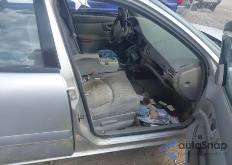 2001 Buick Century Custom z USA, uszkodzony, nr VIN 2G4WS52J511100720